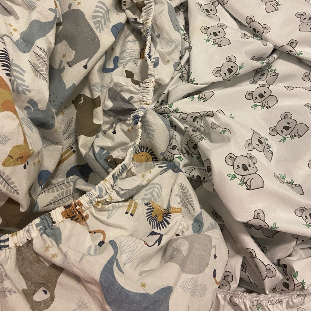 Two crib bed sheets